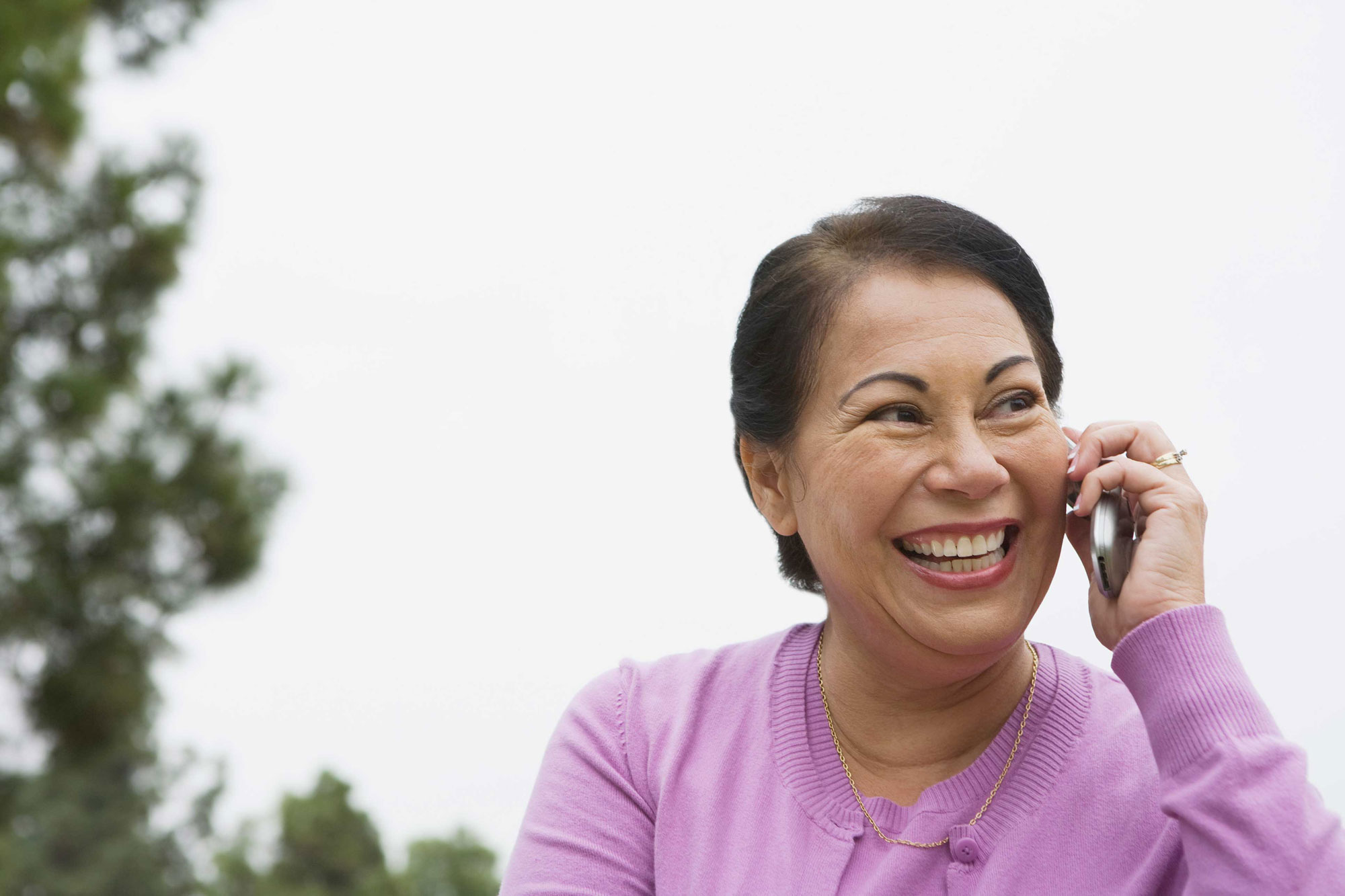 woman smiling on phone